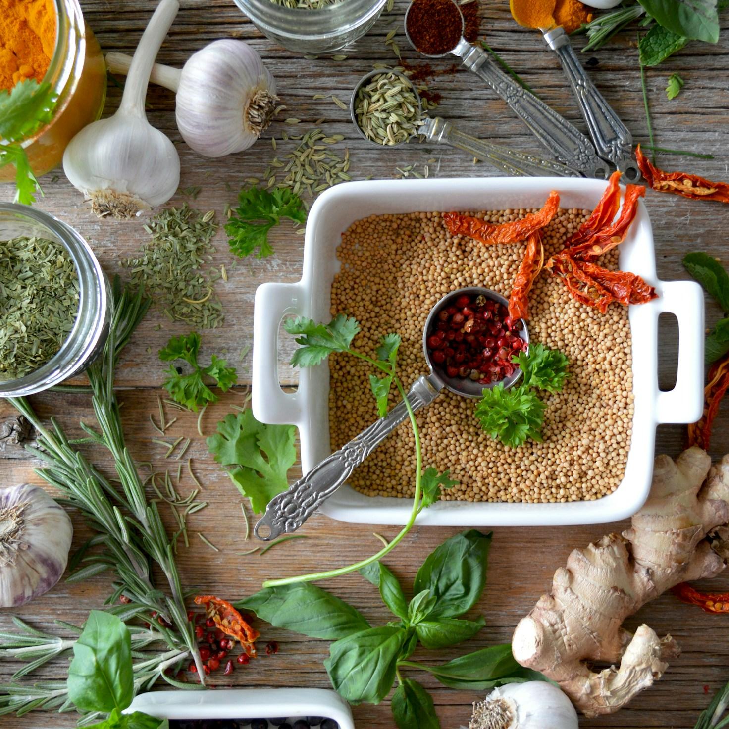 Diverse group of community members sharing a meal together, showcasing the social bonds formed through collaborative cooking